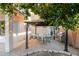 Cozy outdoor dining area with a gazebo, a patio, a grill, and lush greenery at 288 W Los Alamos St, Gilbert, AZ 85233
