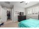 Bedroom with closet and a dresser with a television at 28931 N 64Th Dr, Phoenix, AZ 85083