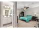 Bright bedroom features an ensuite bathroom and neutral decor at 28931 N 64Th Dr, Phoenix, AZ 85083