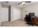 Home office featuring a desk, storage and closet at 28931 N 64Th Dr, Phoenix, AZ 85083