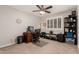 Comfortable home office setup with desk, chair, and storage at 28931 N 64Th Dr, Phoenix, AZ 85083