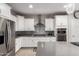 Well-equipped kitchen featuring stainless steel appliances, stylish backsplash, and modern fixtures for culinary enthusiasts at 28931 N 64Th Dr, Phoenix, AZ 85083