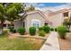 Charming single story home featuring a desert landscaped front yard, a walkway, and a red tile roof at 2929 W Yorkshire Dr # 1066, Phoenix, AZ 85027