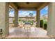 Outdoor patio seating includes a table with four chairs underneath an awning, a great space for relaxation and enjoyment at 2929 W Yorkshire Dr # 1066, Phoenix, AZ 85027