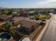 Expansive aerial view of a single Gathering home with a private pool and fully fenced backyard in a suburban neighborhood at 3047 S Chatsworth --, Mesa, AZ 85212