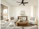 Bright living room with plush seating, a stylish coffee table, and a serene ambiance at 3047 S Chatsworth --, Mesa, AZ 85212