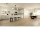 Open-concept living space with a stylish kitchen, dining area, and a well-lit living room, perfect for entertaining at 3047 S Chatsworth --, Mesa, AZ 85212