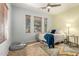 Bedroom with three windows, neutral paint and tiled floors at 3387 E Bluejay Dr, Chandler, AZ 85286
