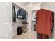 Walk-in closet featuring built-in shelving and hanging space for organized storage of clothing and accessories at 3387 E Bluejay Dr, Chandler, AZ 85286