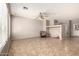 Open-concept living space with tile flooring, neutral walls, and comfortable seating with good natural light at 3387 E Bluejay Dr, Chandler, AZ 85286