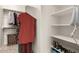 Walk-in closet features built in shelving and clothing racks for optimal storage at 3387 E Bluejay Dr, Chandler, AZ 85286