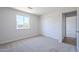 Bedroom featuring neutral paint, carpet and window with blinds at 340 W Riviera Dr, Tempe, AZ 85282