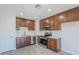 Updated kitchen features modern stainless steel appliances, light counters and stylish cabinets at 340 W Riviera Dr, Tempe, AZ 85282