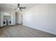 Spacious living area features wood-look floors and laundry nook at 340 W Riviera Dr, Tempe, AZ 85282