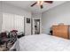 Bedroom showcasing a comfortable bed and organized closet and dresser space at 36197 W Cartegna Ln, Maricopa, AZ 85138
