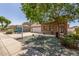 Charming single-story home with stucco and stone accents, tile roof, and a well-manicured front yard at 36197 W Cartegna Ln, Maricopa, AZ 85138