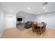Well-lit open floor plan integrating the dining area and Gathering room for seamless entertaining and relaxation at 4115 W Danbury Dr, Glendale, AZ 85308