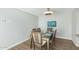 Formal dining area with contemporary light fixture and seating for six at 5047 N 83Rd St, Scottsdale, AZ 85250