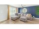 Open-concept living room with a comfortable sofa and great natural light at 5047 N 83Rd St, Scottsdale, AZ 85250