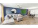 Open-concept living area with a comfortable sectional sofa and great natural light at 5047 N 83Rd St, Scottsdale, AZ 85250