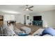 Spacious living area with hardwood floors, a sectional sofa, and open concept design at 5047 N 83Rd St, Scottsdale, AZ 85250
