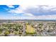 Sweeping aerial view showcasing a vibrant community with lush greenery, well-planned streets, and distant mountains at 5052 W Boston S Way, Chandler, AZ 85226