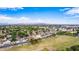 Picturesque aerial shot of a neighborhood with lush greenery, tree-lined streets, and scenic mountain views at 5052 W Boston S Way, Chandler, AZ 85226