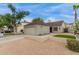 Charming single-story home with well-maintained landscaping, a two-car garage, and a welcoming entryway at 5052 W Boston S Way, Chandler, AZ 85226