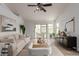 Bright living room with vaulted ceilings, neutral tones, and sliding glass doors to the patio at 5052 W Boston S Way, Chandler, AZ 85226