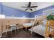 Cozy bedroom featuring two tone paint, a bunkbed, and desk creating a fun, functional space at 517 S 165Th Dr, Goodyear, AZ 85338