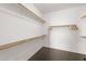 Walk-in closet with ample shelving and storage, ideal for organizing clothes and accessories at 517 S 165Th Dr, Goodyear, AZ 85338