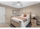 Serene bedroom with soft carpet, a ceiling fan, and matching bedside tables at 6220 E Paradise Ln, Scottsdale, AZ 85254