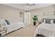Inviting bedroom features twin beds and carpet floors, with plenty of natural light at 6220 E Paradise Ln, Scottsdale, AZ 85254