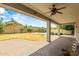 Expansive backyard with covered patio, low-maintenance desert landscaping, and view of swimming pool at 6245 W Maya Dr, Phoenix, AZ 85083