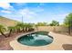 Private backyard pool surrounded by lush greenery, creating a serene and refreshing outdoor space at 6245 W Maya Dr, Phoenix, AZ 85083
