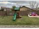 Large backyard featuring a playset and a privacy fence at 6920 S 46Th Dr, Laveen, AZ 85339