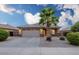 Charming single-story home with a well-maintained front yard and a two-car garage at 6920 S 46Th Dr, Laveen, AZ 85339