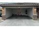 Spacious two car garage with overhead lighting, perfect for parking and storage at 6920 S 46Th Dr, Laveen, AZ 85339