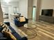 Open living room with kitchen view, stylish furnishings, and contemporary decor at 6920 S 46Th Dr, Laveen, AZ 85339