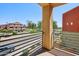A condo balcony overlooks the community park and green space at 7601 E Roosevelt St # 1007, Scottsdale, AZ 85257