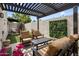 Charming backyard with a covered patio, stylish seating and an easy-to-maintain lawn at 8083 E Via Del Valle --, Scottsdale, AZ 85258