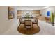 Stylish kitchen and breakfast nook featuring modern appliances, light wood cabinetry and decorative art at 8083 E Via Del Valle --, Scottsdale, AZ 85258