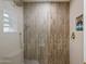 Modern shower featuring unique tile, a rainfall shower head and built-in shelving for a spa-like experience at 8083 E Via Del Valle --, Scottsdale, AZ 85258