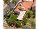Backyard space featuring a well-maintained lawn, trees, and plants, perfect for outdoor entertaining at 936 E Gila Ln, Chandler, AZ 85225