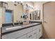 Modern bathroom featuring dual sinks, sleek countertops, and ample cabinet space at 936 E Gila Ln, Chandler, AZ 85225