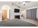 Spacious bedroom featuring a vaulted ceiling and access to the ensuite bathroom at 936 E Gila Ln, Chandler, AZ 85225
