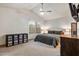 Calming bedroom with vaulted ceiling, a ceiling fan and a comfortable bed at 936 E Gila Ln, Chandler, AZ 85225