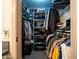 Organized walk-in closet offering ample storage space for clothing and accessories at 936 E Gila Ln, Chandler, AZ 85225