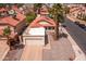 Charming single-Gathering home with red tile roof, desert landscaping, and an attached two-car garage at 936 E Gila Ln, Chandler, AZ 85225