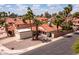 Attractive home featuring a red tile roof, desert landscaping, an attached garage, and easy street access at 936 E Gila Ln, Chandler, AZ 85225